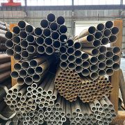 Seamless carbon steel pipe for high-temperature and pressure fluid systems