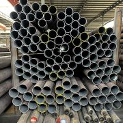 Seamless carbon steel pipe for high-temperature and pressure fluid systems