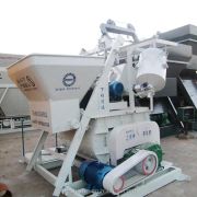 Efficient dual-shaft concrete mixer with 500-liter discharge for small-scale projects